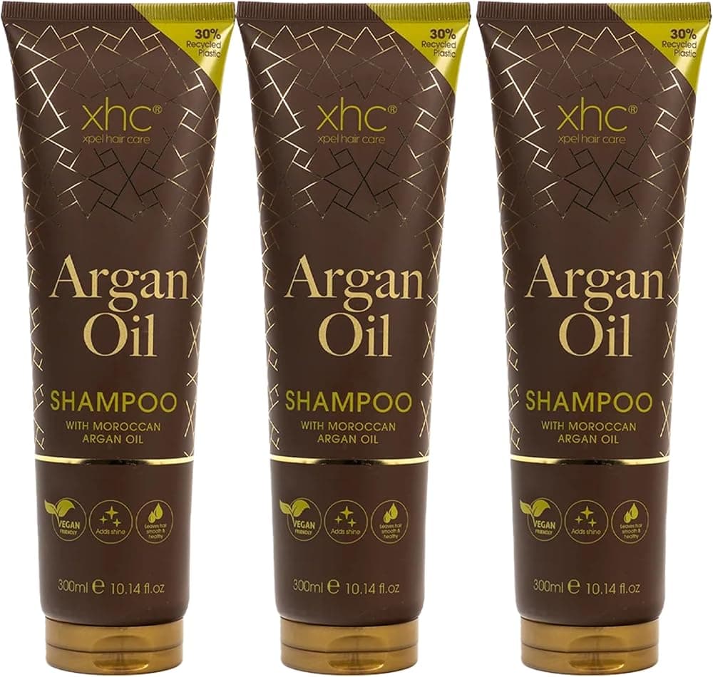 Three XHC Argan Oil shampoo bottles